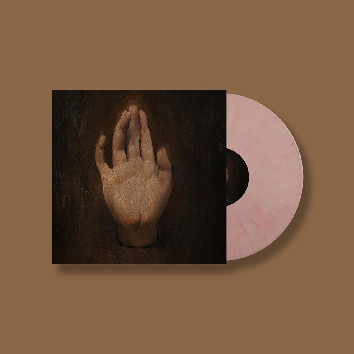Vinyl record with album art of a raised, painted hand.