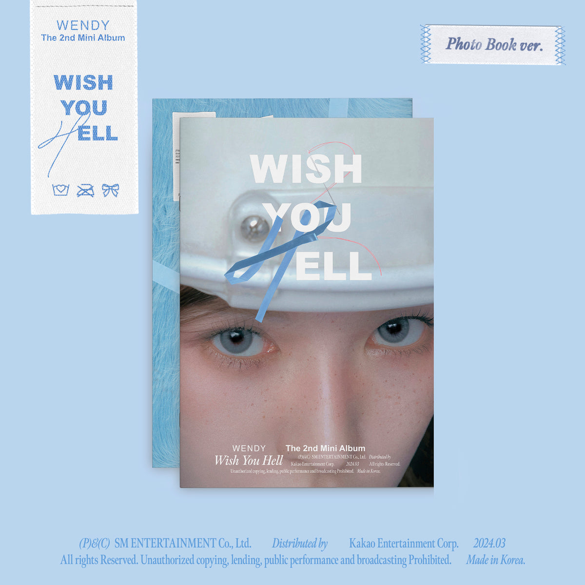 Wendy’s “Wish” album cover featuring a close-up portrait with blue tones.