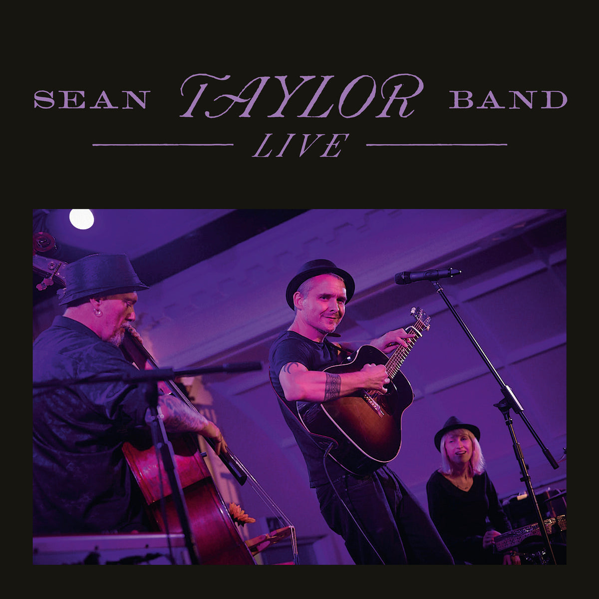 Sean Taylor Band live album cover featuring three musicians on stage.