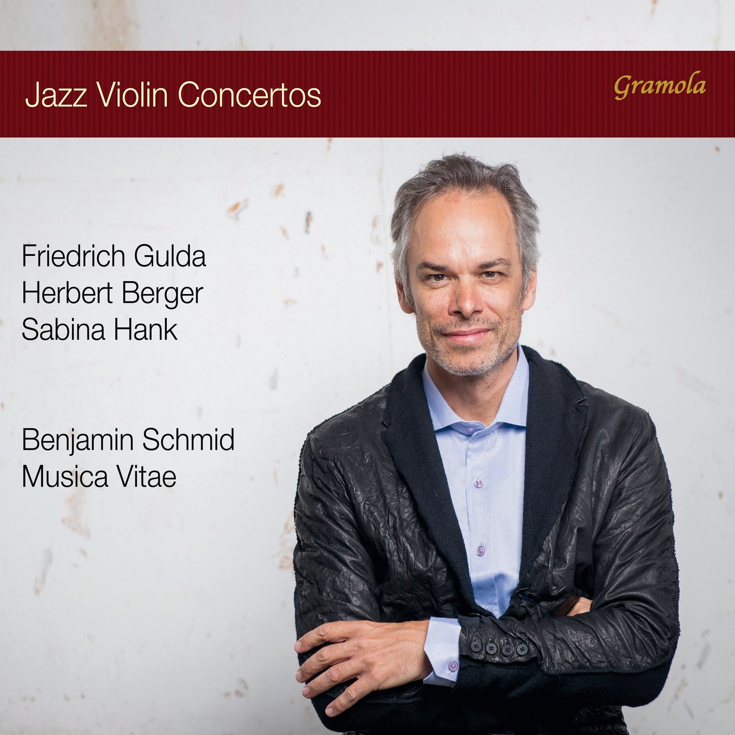 CD cover featuring portrait of a smiling man with short grey hair.