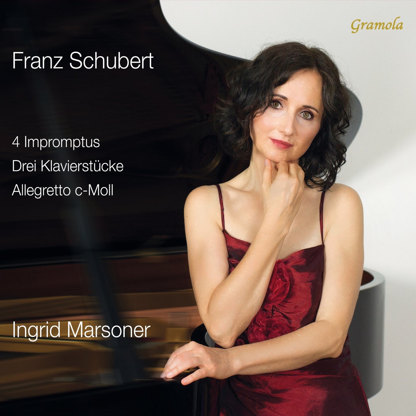 CD cover featuring pianist Ingrid Marsoner in a red dress.
