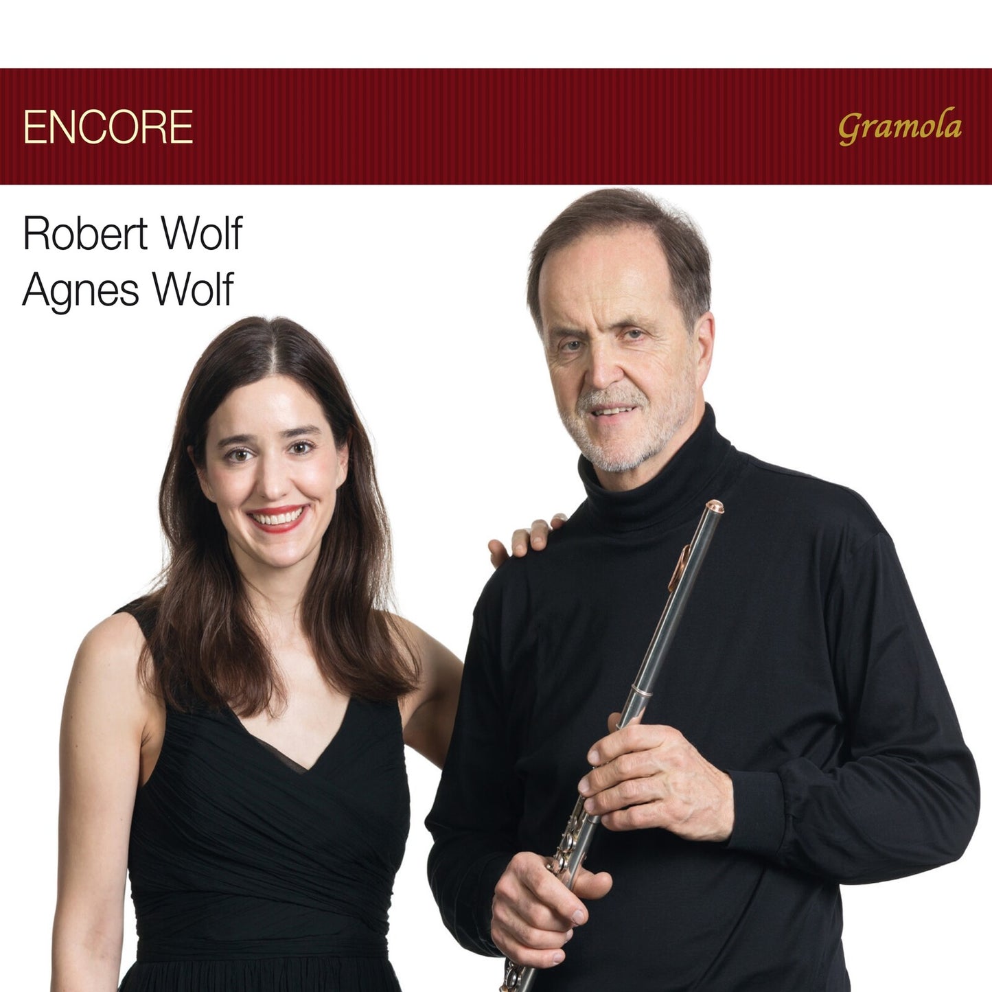CD cover featuring portraits of Robert and Agnes Wolf with a flute.