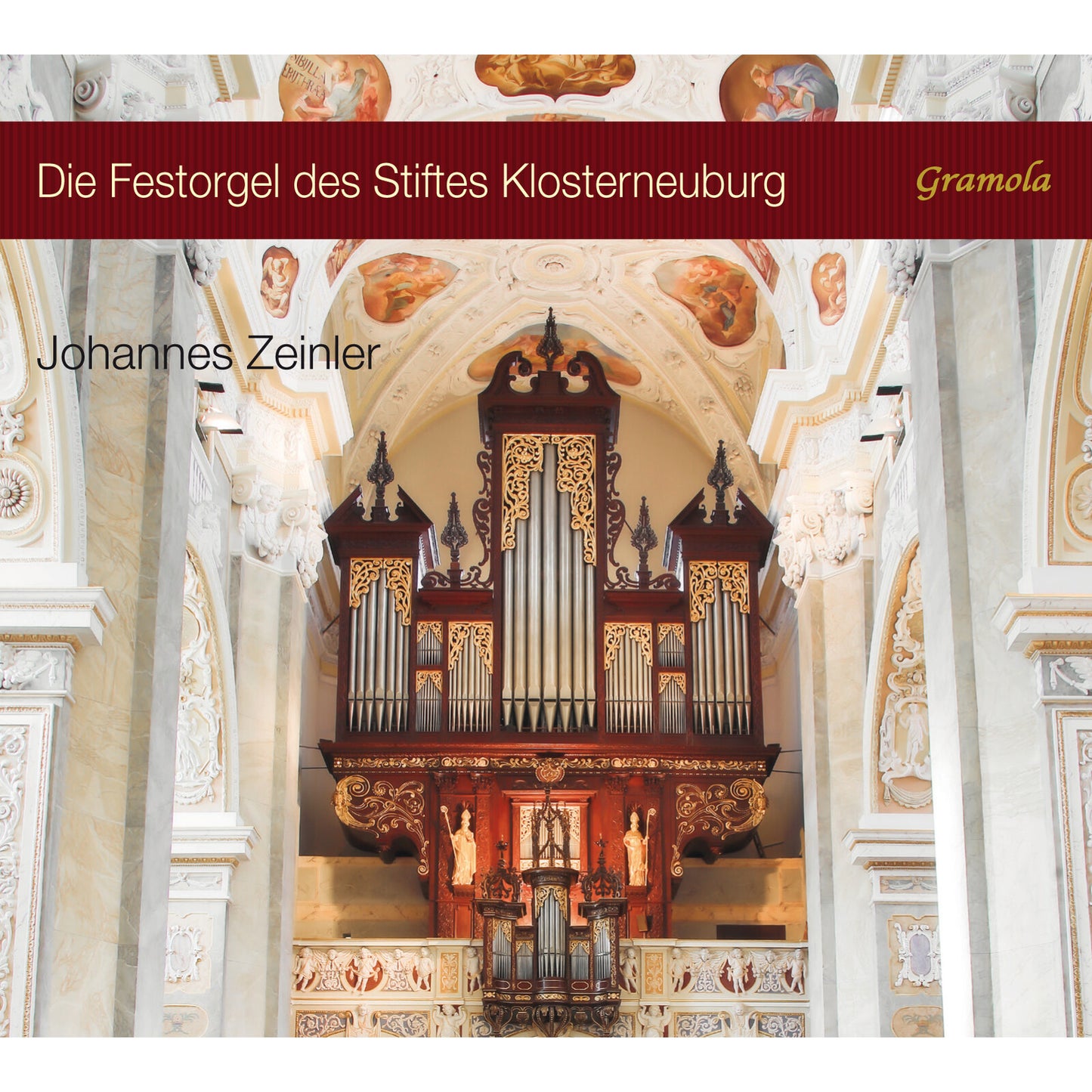 Ornate pipe organ inside a baroque church, CD cover art.
