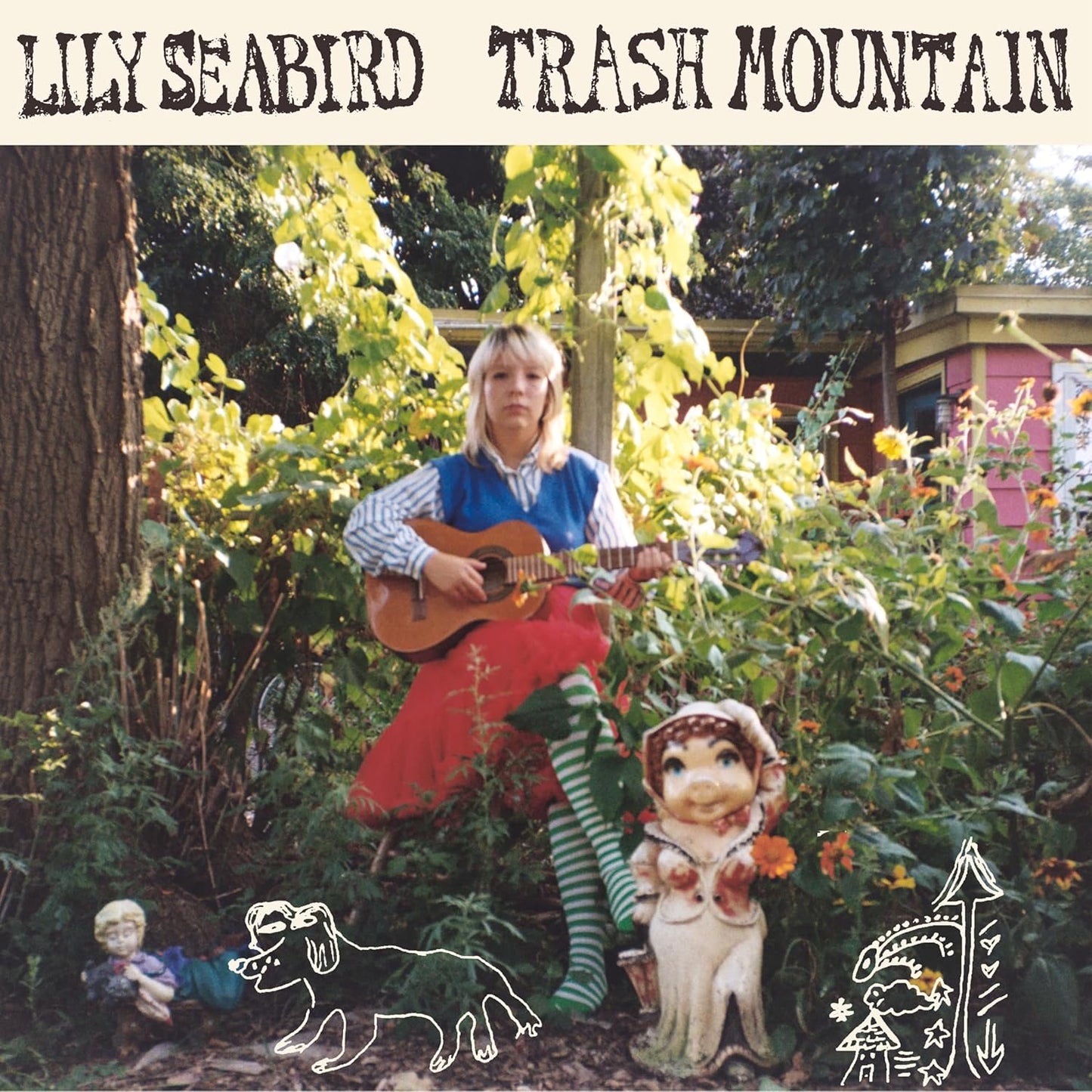 Pink vinyl record of Seabird,lily’s “Trash Mountain” with barcode visible.