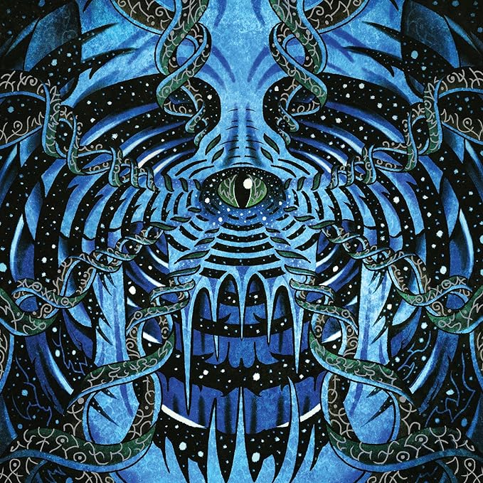 Blue and black symmetrical artwork featuring a stylized, monstrous face.