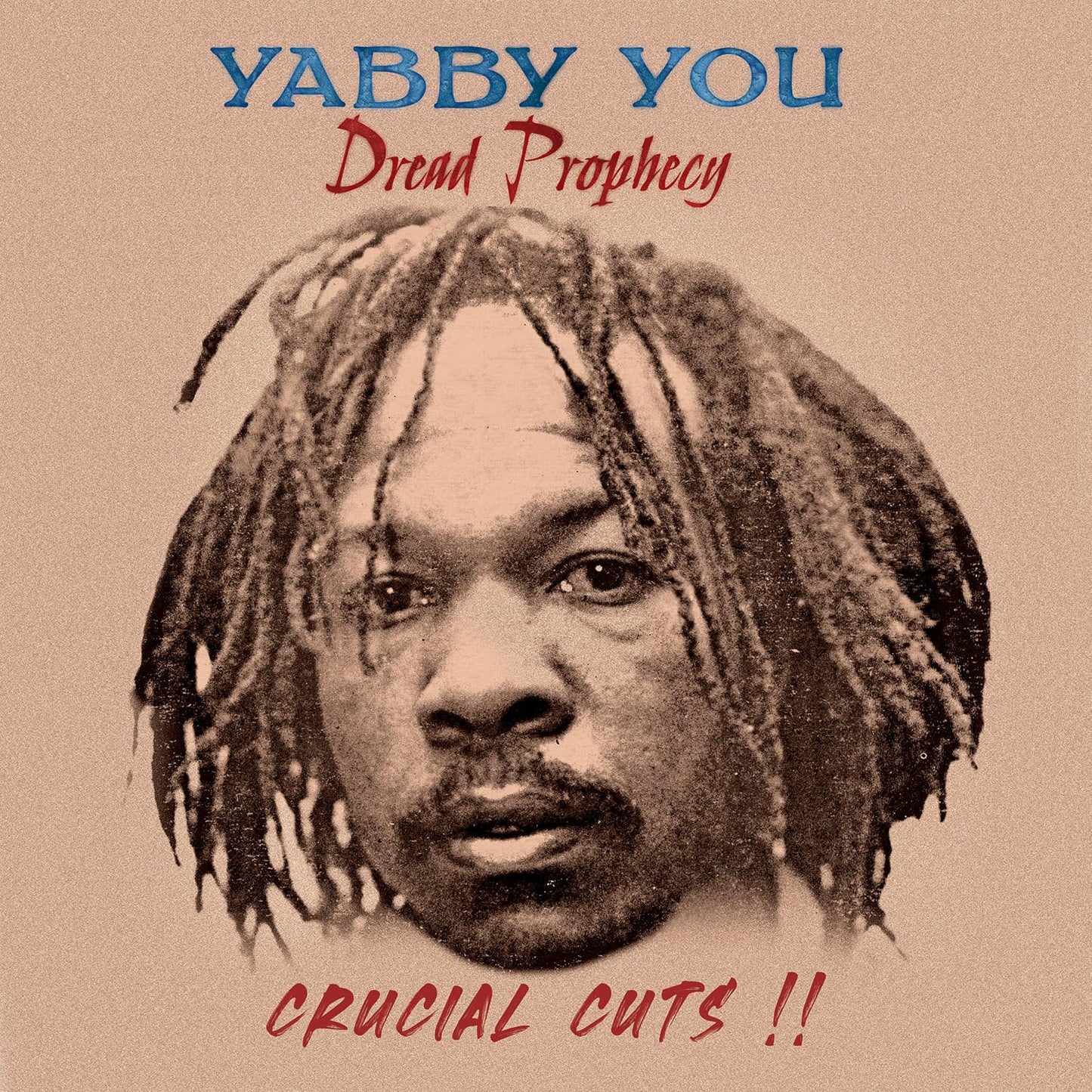 Album cover featuring a portrait of Yabby You with dreadlocks on a tan background.