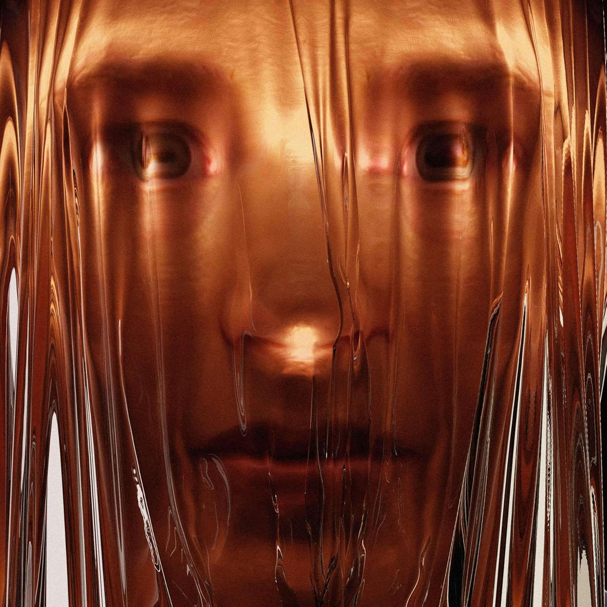 Close-up of a face partially obscured by translucent, flowing brown material.