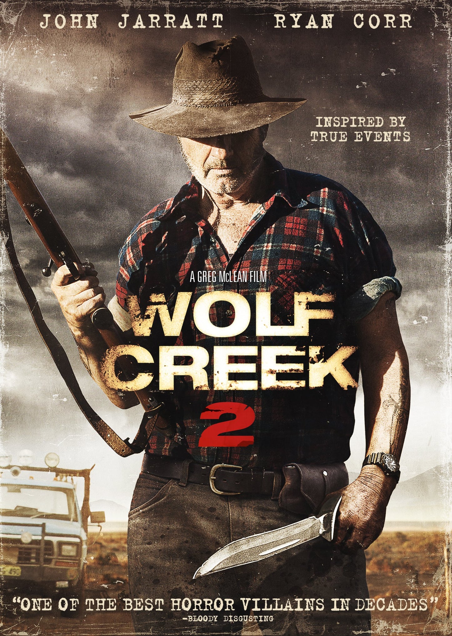 Wolf Creek 2 DVD cover featuring a man with a hat and knife.