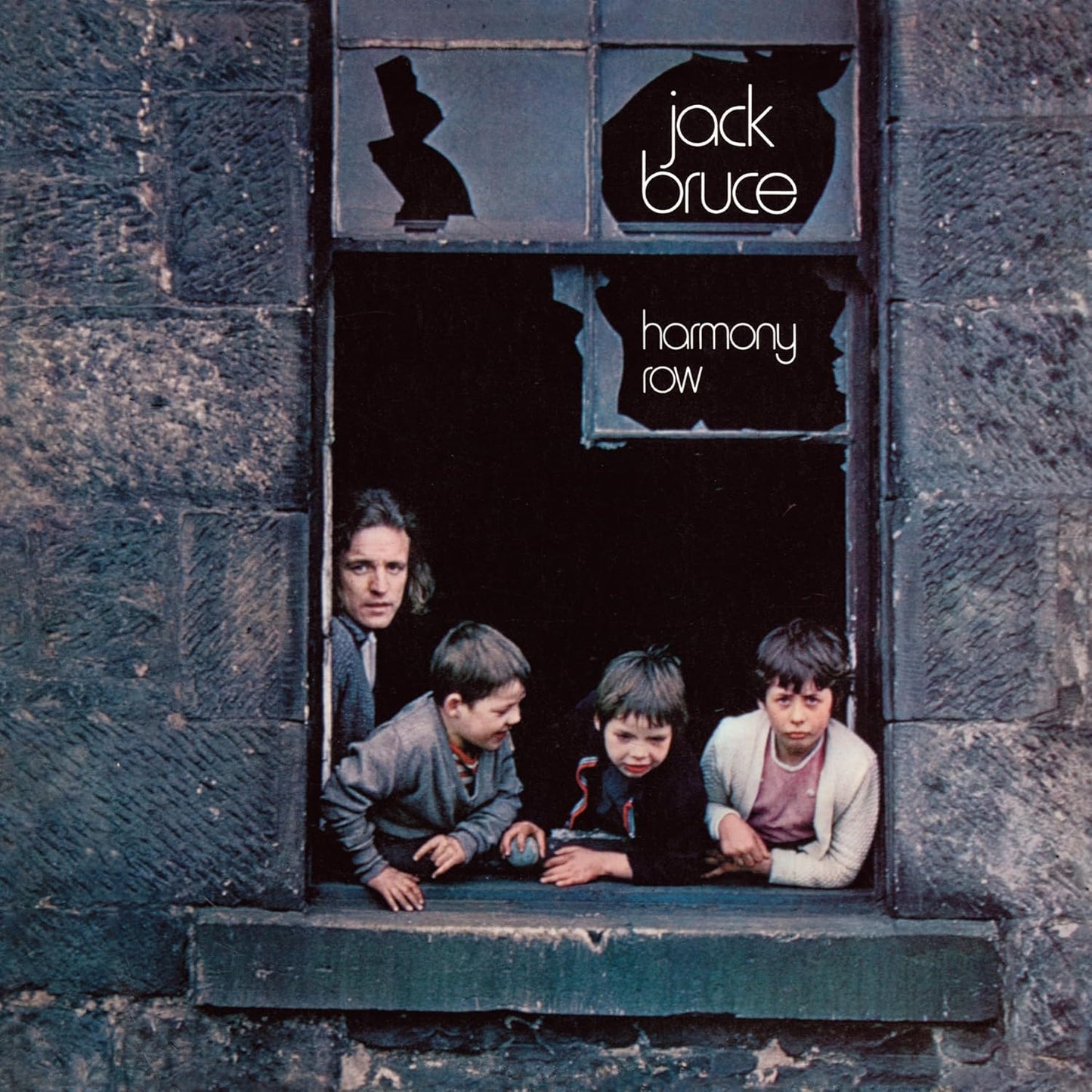 Album cover: Jack Bruce’s “Harmony Row” featuring people in a window.