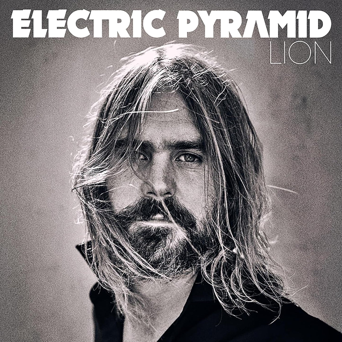 Black and white CD cover featuring a close-up portrait of a man.