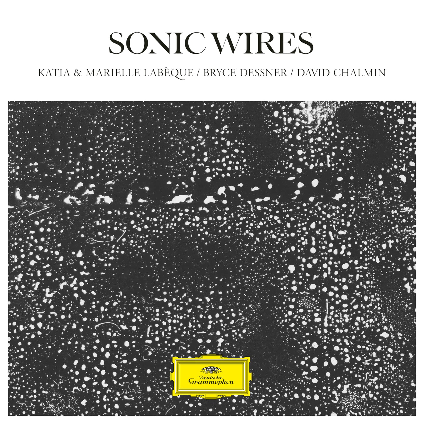 Album cover for "Sonic Wires" with speckled black and white design.