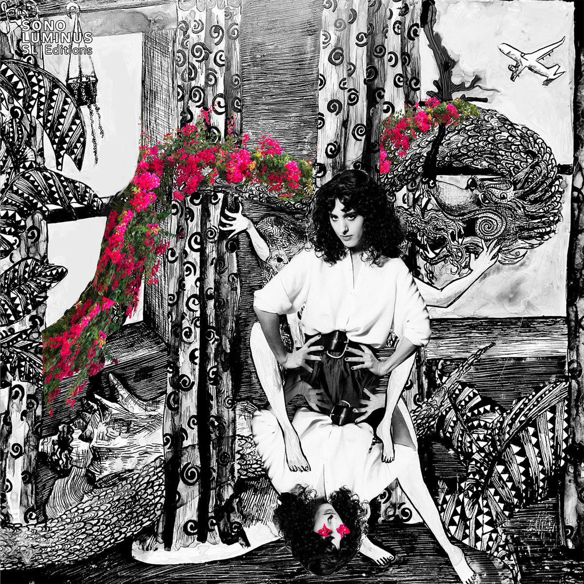 Black and white album cover with a woman and ornate, swirling designs.