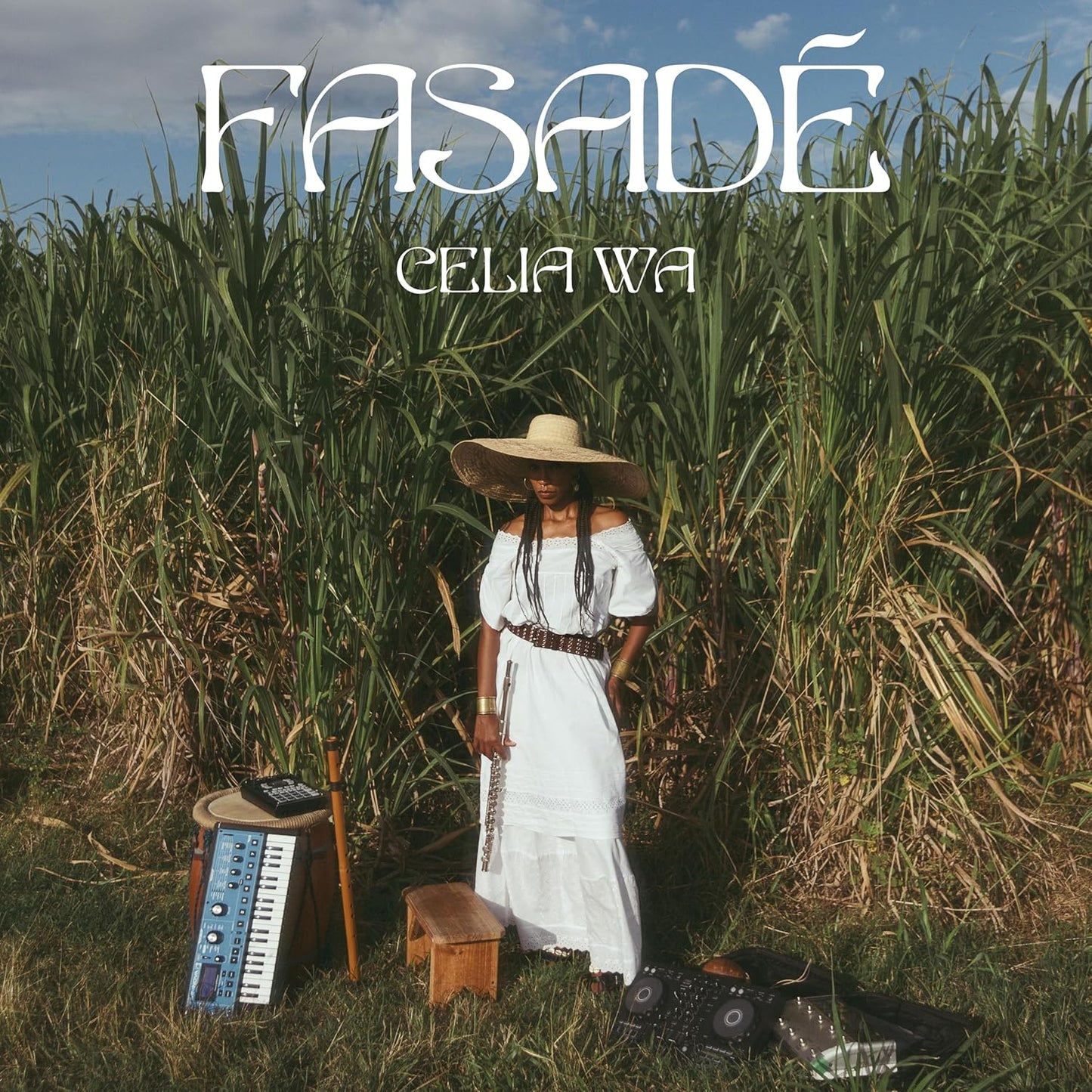 Album cover for Celia Wa’s “Fasade” featuring a woman in a cornfield.