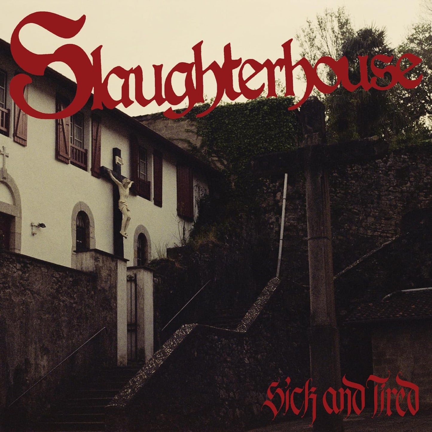 Slaughterhouse album cover: a building, stairs, and red text “Sick and Tired.”