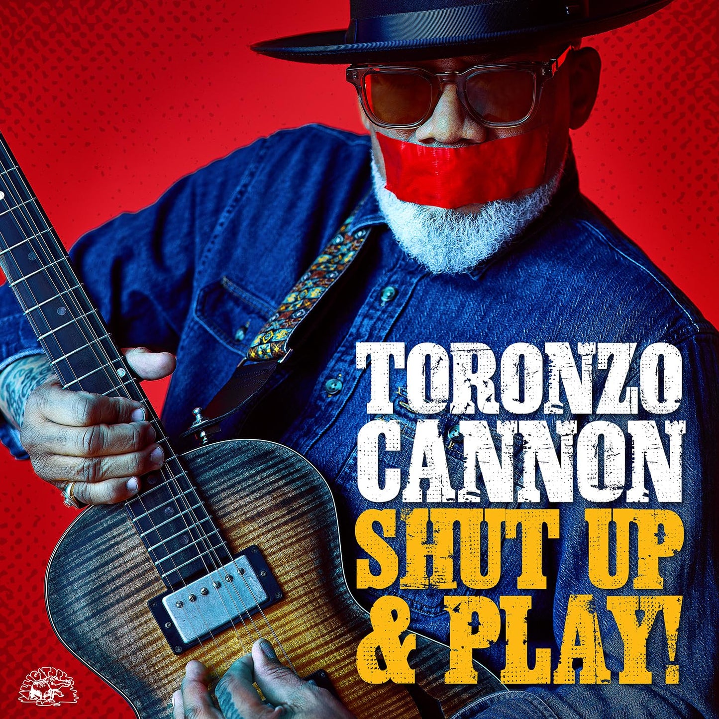 Toronzo Cannon album cover featuring a musician with a guitar.