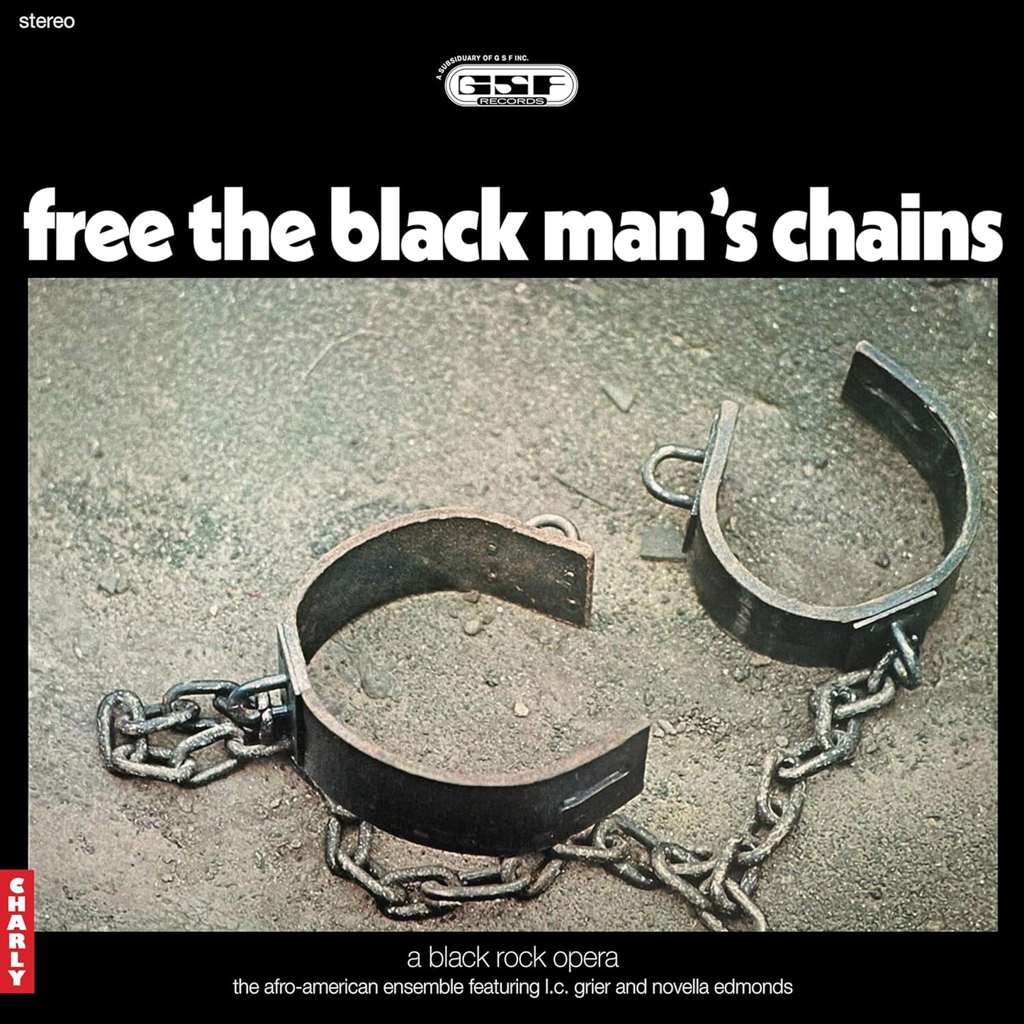 Vinyl record cover: broken shackles against a textured grey background.