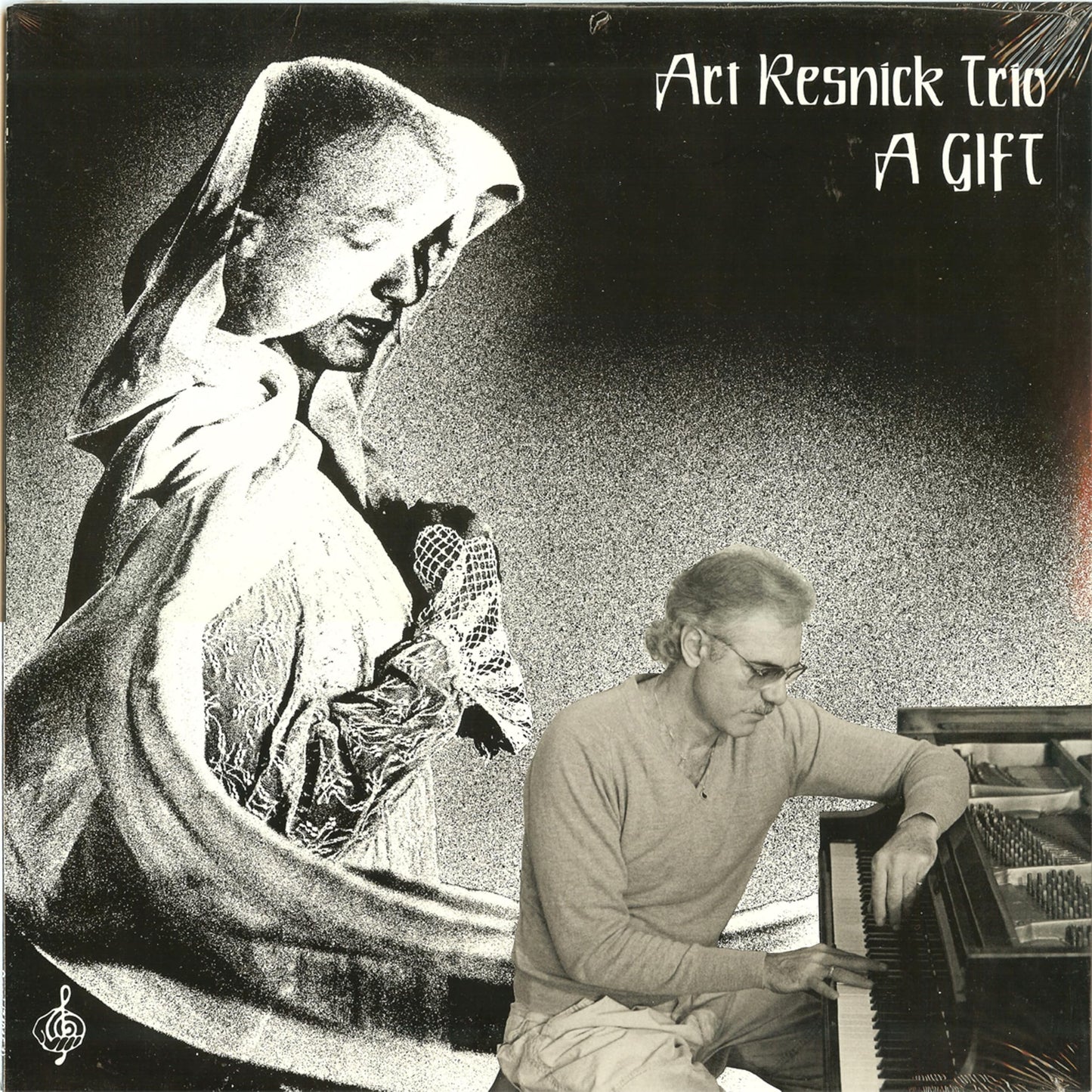 Black and white vinyl album cover featuring a woman and pianist.