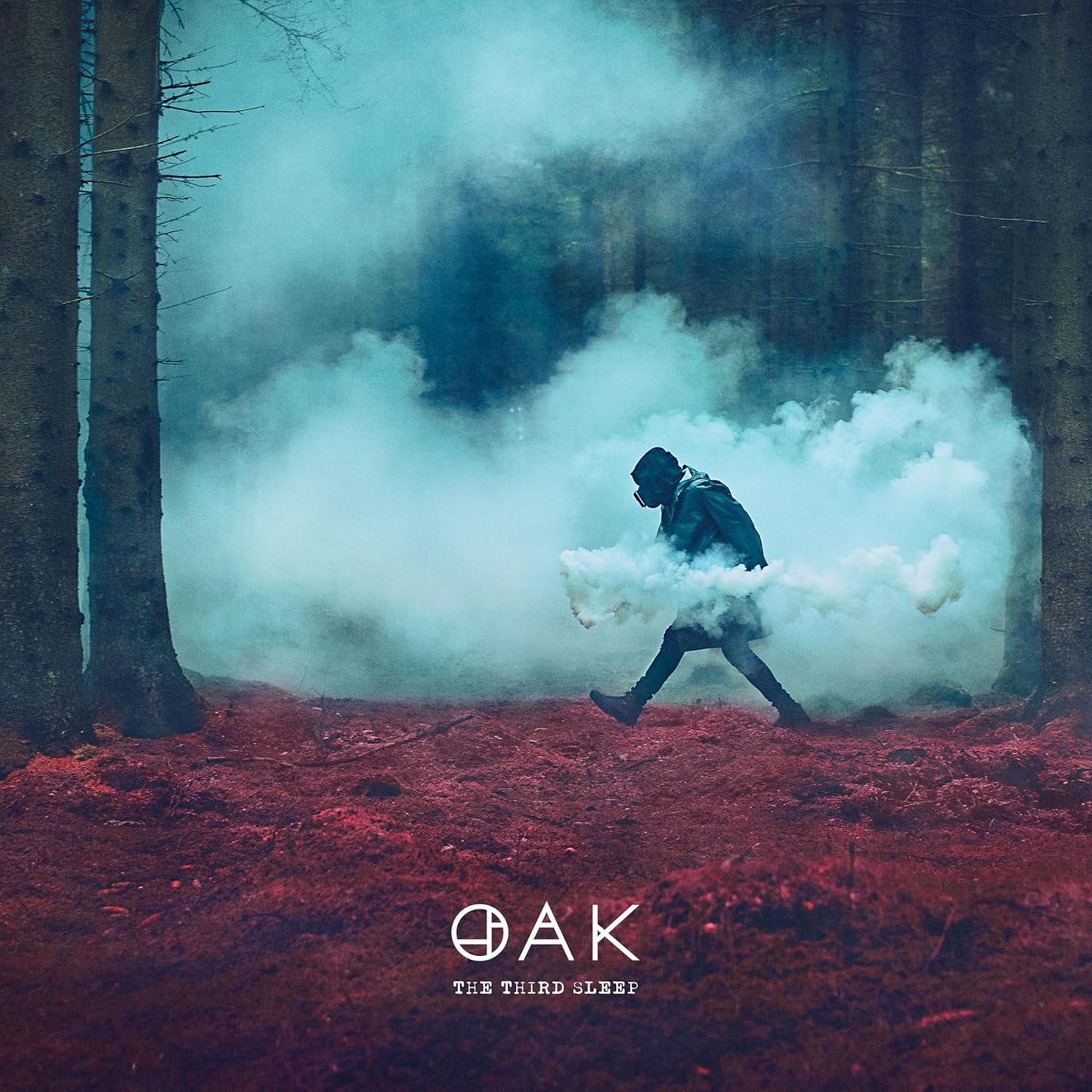 Album cover: hooded figure in a smoky forest, with band name "Oak".