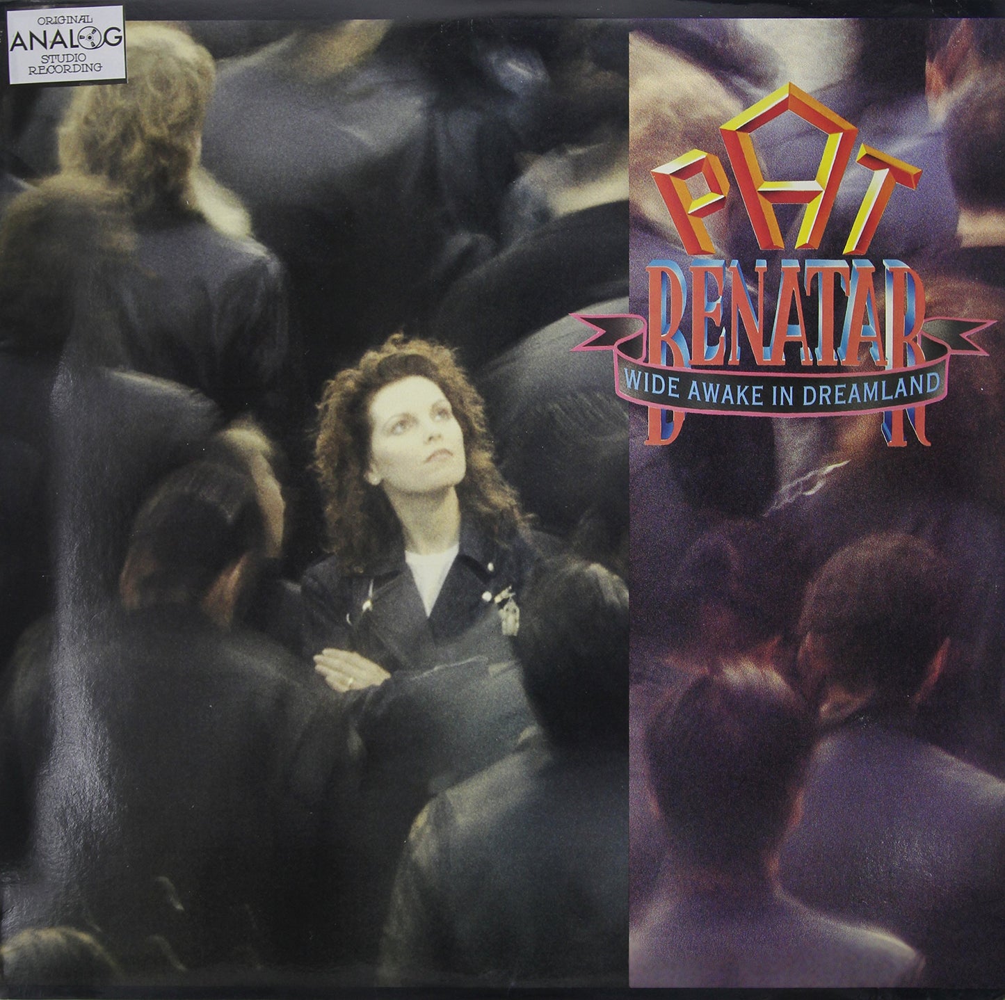 Vinyl record cover featuring Pat Benatar and album title “Wide Awake in Dreamland”.