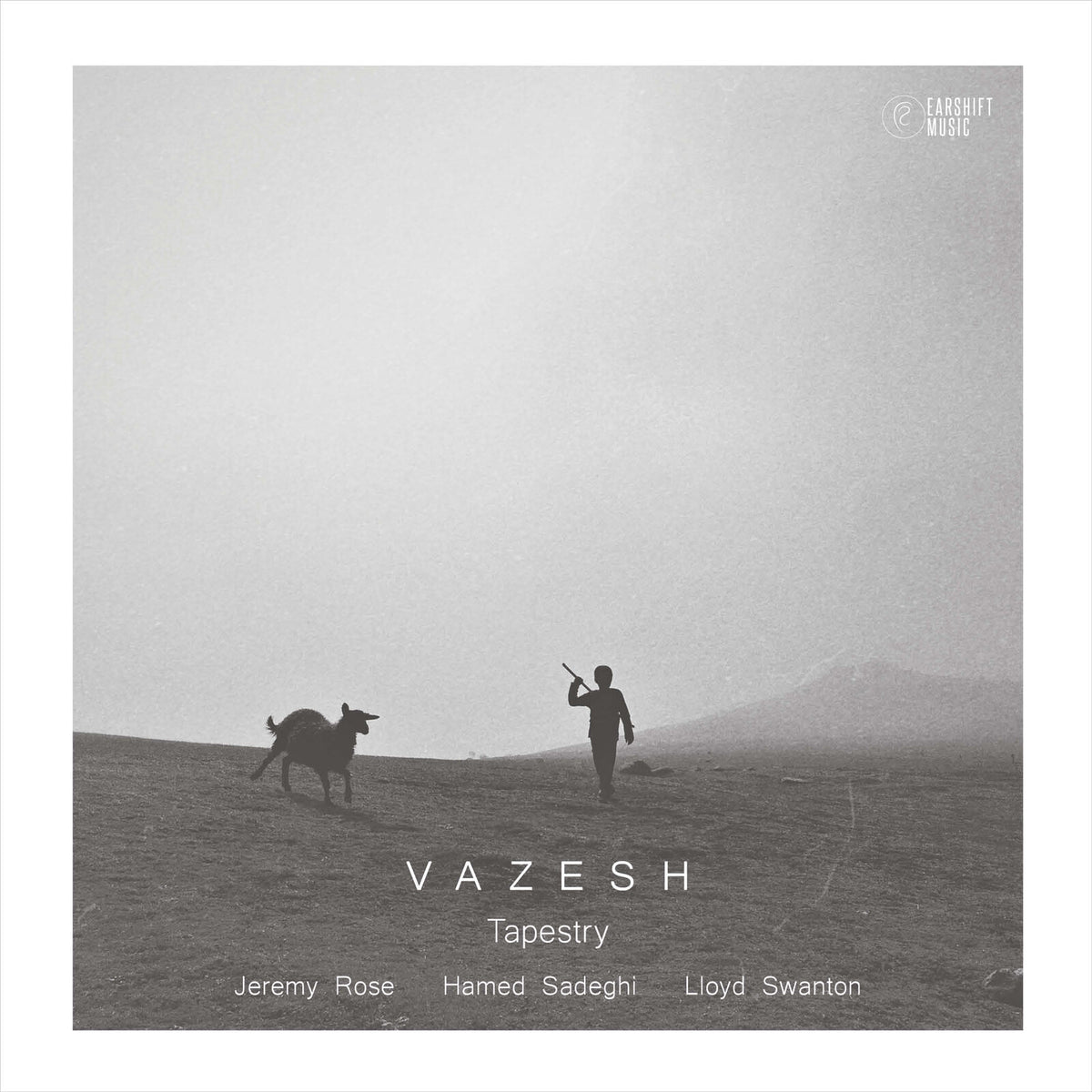 Black and white CD cover with a silhouetted figure and animal on a hill.