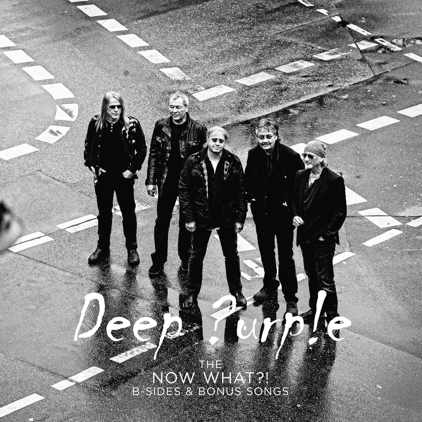 Black and white album cover of Deep Purple standing on a crosswalk.