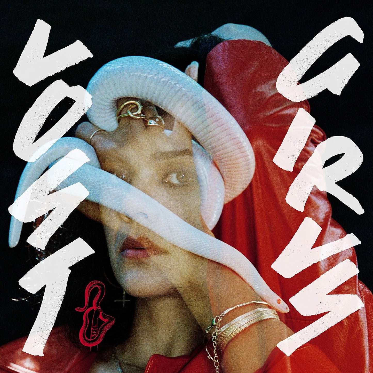 Vinyl record cover featuring a portrait of Natasha Khan against a dark, moody background.