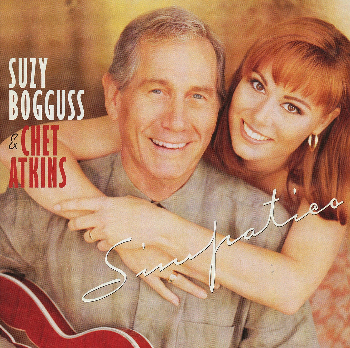 CD cover featuring Suzy Bogguss and Chet Atkins smiling, with a guitar.