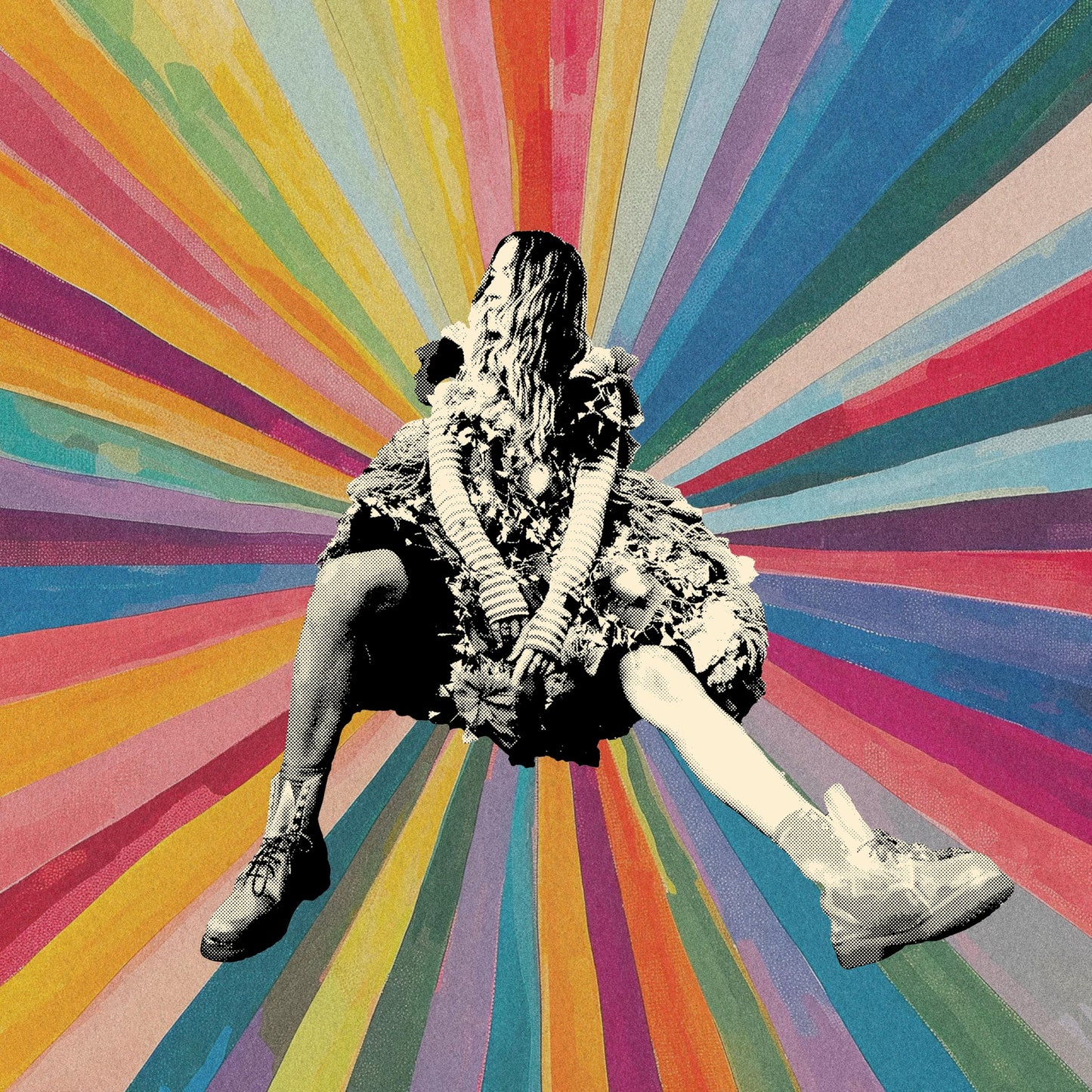 Lauren Daigle squats against a vibrant, radial burst of rainbow colors.