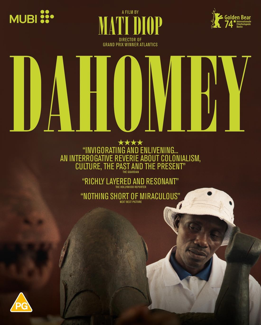 “Dahomey” Blu-ray cover with a man wearing sunglasses and a sculpture.