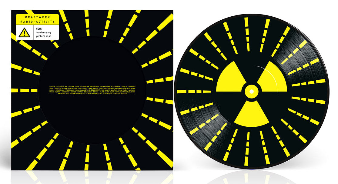 Black vinyl record with yellow radiation warning symbol and striped sleeve.