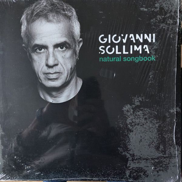 Black and white portrait of Giovanni Sollima on vinyl record cover.