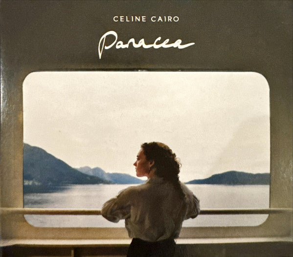 CD cover: woman looking at a lake through a window frame.