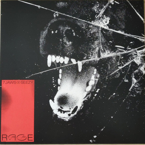 Vinyl record cover featuring a snarling dog’s face with shattered glass.
