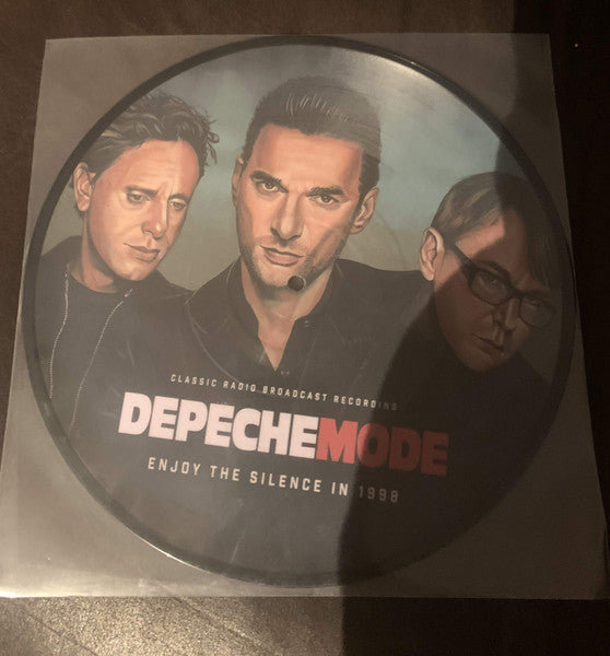 10-inch vinyl record featuring Depeche Mode band members in portrait.
