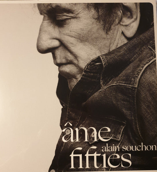 Sepia profile portrait of Alain Souchon on the Ame Fifties vinyl album cover.