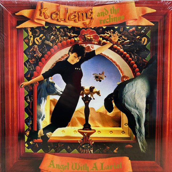 k.d. lang album cover featuring a woman in front of a mirror.