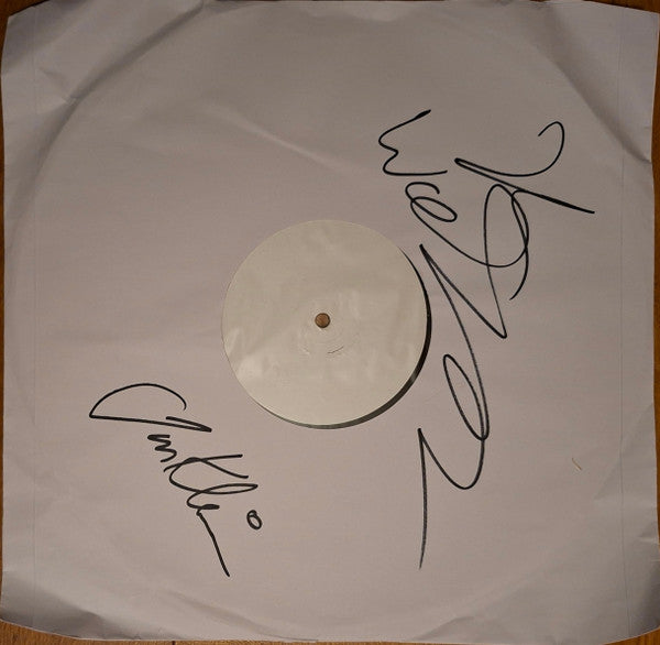White vinyl record in a sleeve, signed by Jah Wobble and Jon Klein.