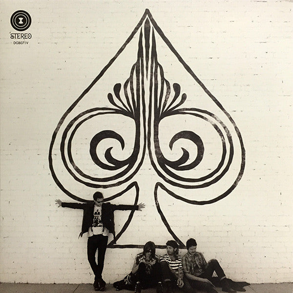 Black and white album cover with a large spade and four people.