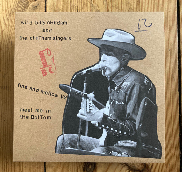 Vinyl record cover featuring a black and white photo of a musician with a guitar.