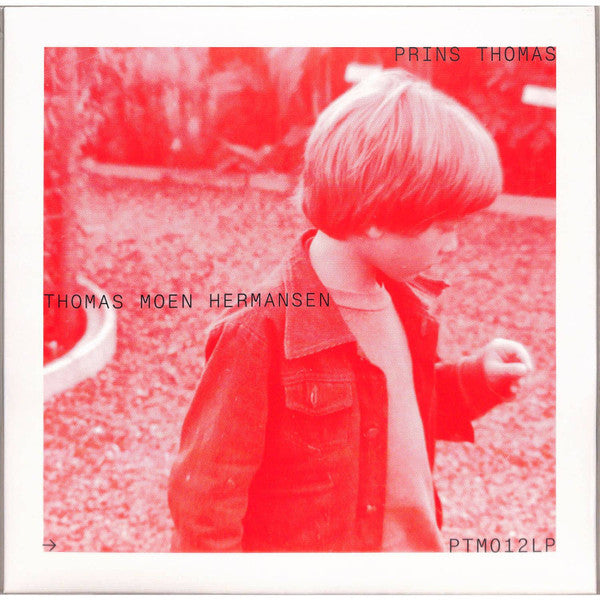 Red-toned album cover featuring a young boy with short hair looking down.