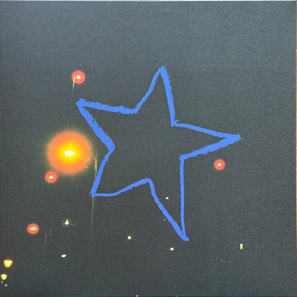 Black album cover with a blue star outline and orange dots.