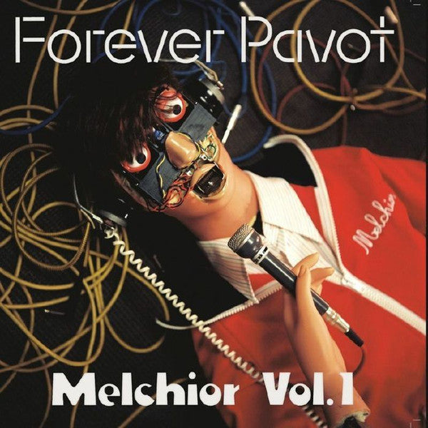Album cover featuring a person in a colorful mask holding a microphone.