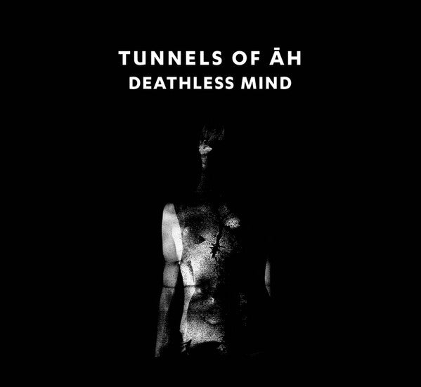Black and white album cover with a distorted figure and text.