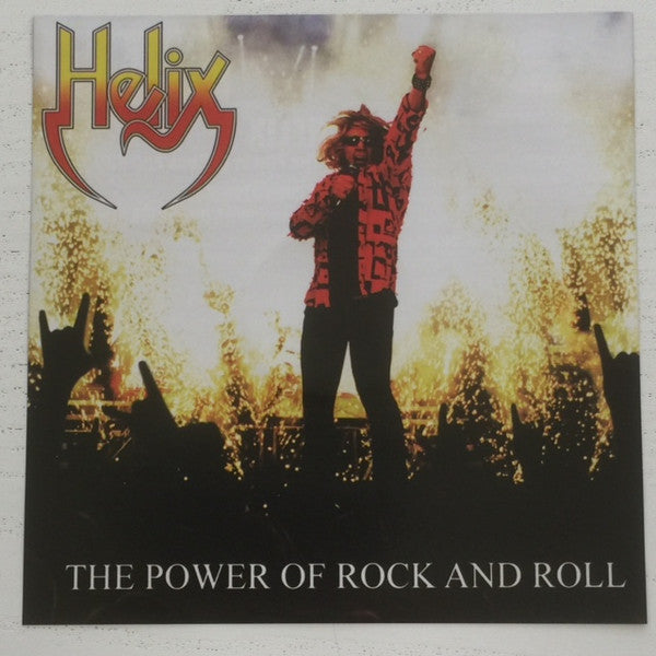 Helix album cover: singer with raised fist before a crowd.