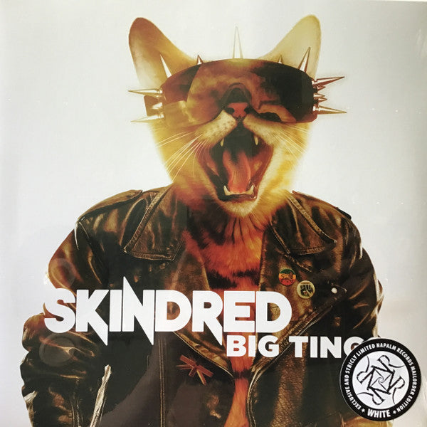 Album cover: a cat wearing a leather jacket and sunglasses, Skindred text.