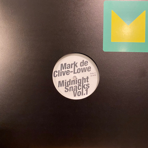 Black vinyl record label with white text: "Mark de Clive-Lowe - Midnight Snacks Vol. 1".