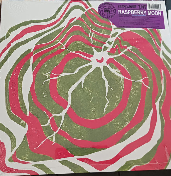 Vinyl record with swirling green and pink marbled pattern and sticker.