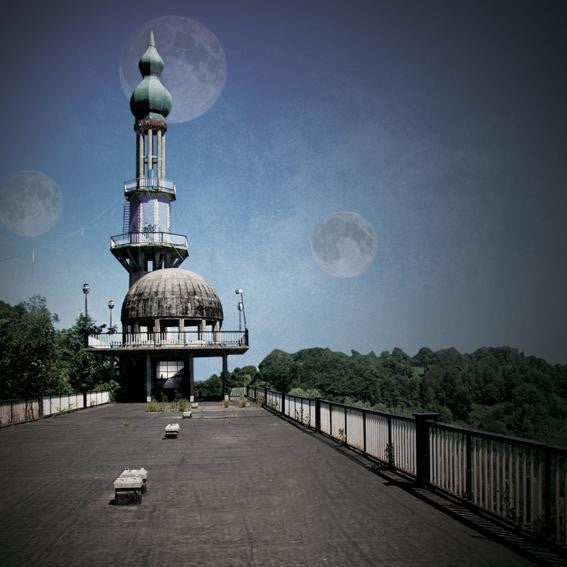 CD cover with a tall, ornate tower under a moonlit sky.