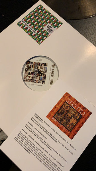 Vinyl record sleeve for "Stretto" by Erik Escobar, featuring colorful artwork.