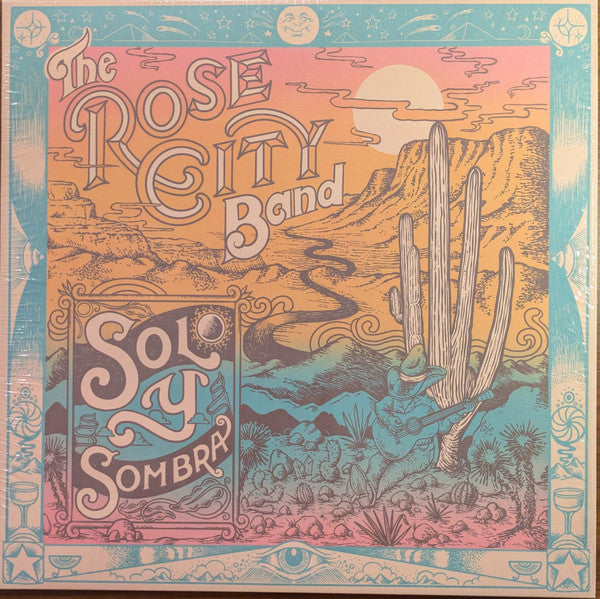 Psychedelic album cover featuring a desert landscape with a guitarist and a saguaro cactus.
